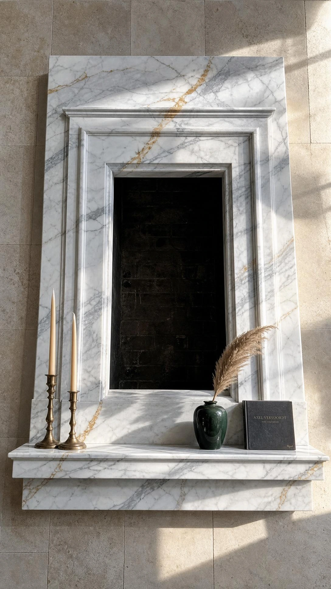 Carrara marble fireplace surround photographed from above, showing dramatic grey and gold veining across polished white stone framing a dark firebox opening