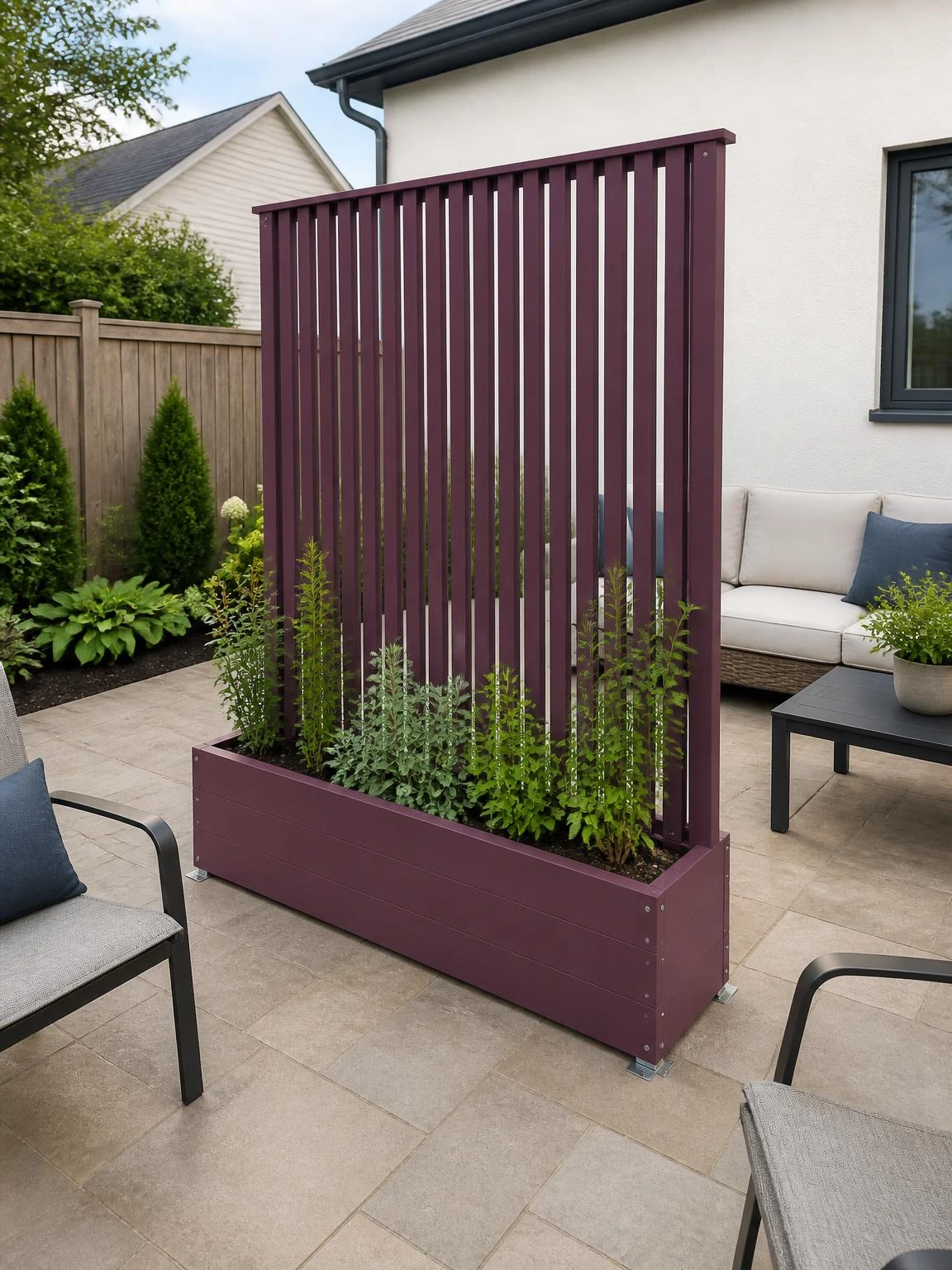 Muted-plum slatted privacy screen planter with soft-green foliage, ballast, and patio clearance for a DIY garden project